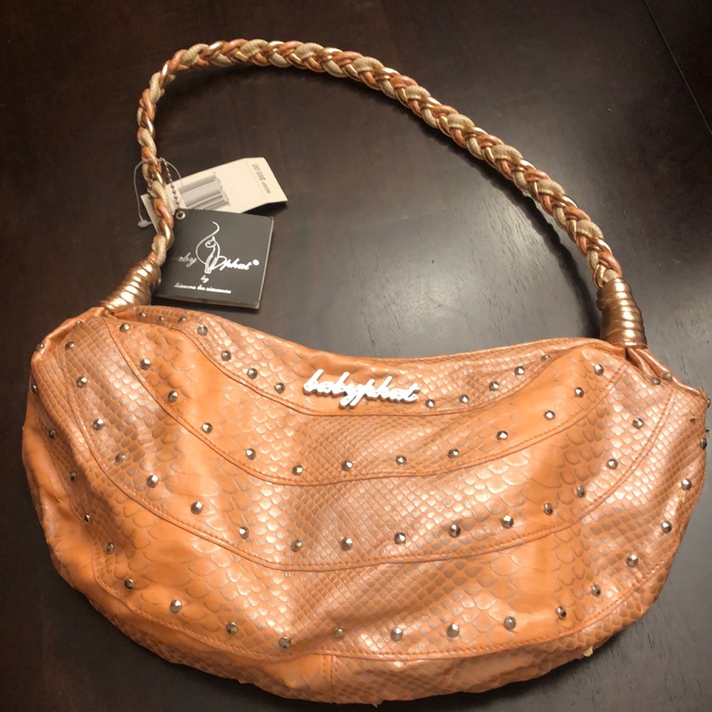Salmon/orange Baby Phat Purse.